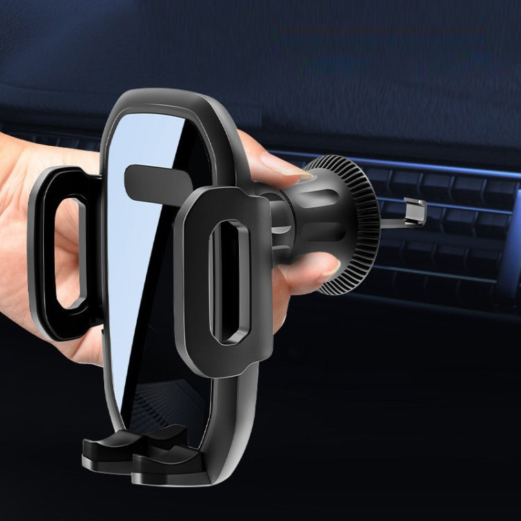 Black car phone holder clamped to a dashboard air vent with hand adjustment