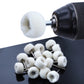 Cashmere polishing wheel mounted on a rotary tool with white wool pads