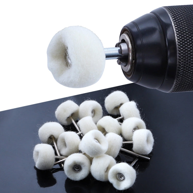 Cashmere polishing wheel mounted on a rotary tool with white wool pads