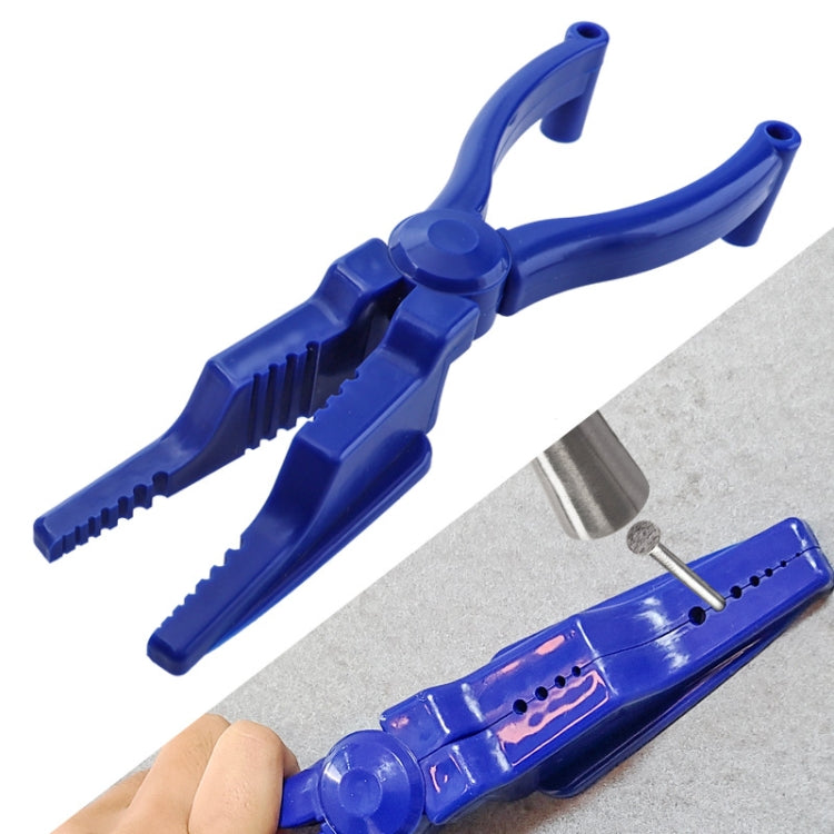 Blue plastic nail fixing tool with hammer protector arm and pronged grip