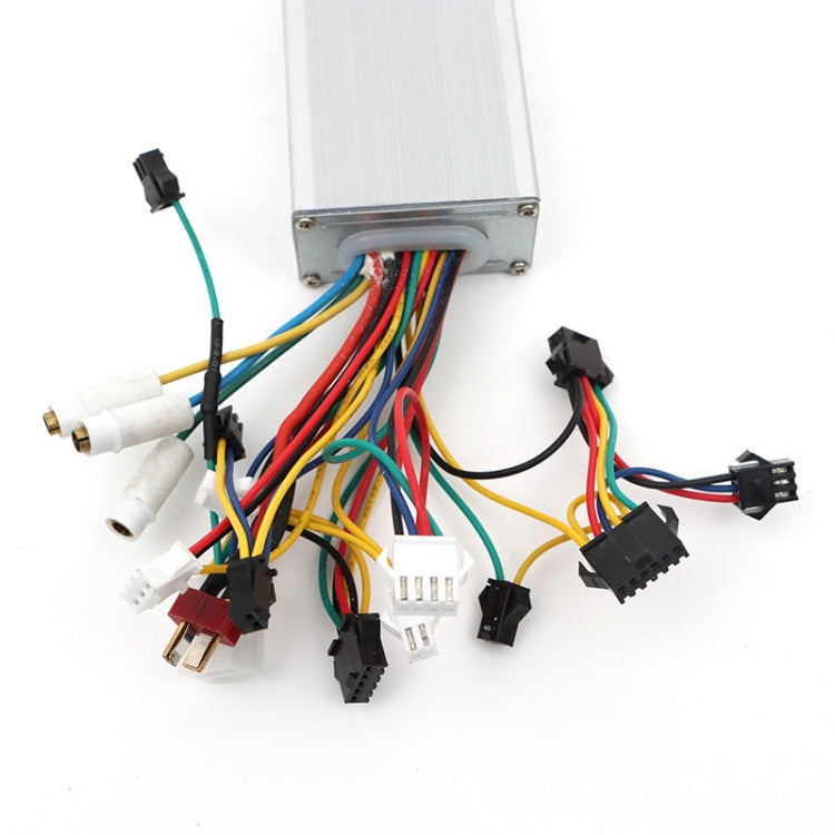 Electric bicycle motor controller close-up with aluminum case and multiple plug connectors