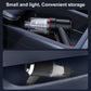 Compact cordless car vacuum cleaner stored in console with transparent dust cup housing