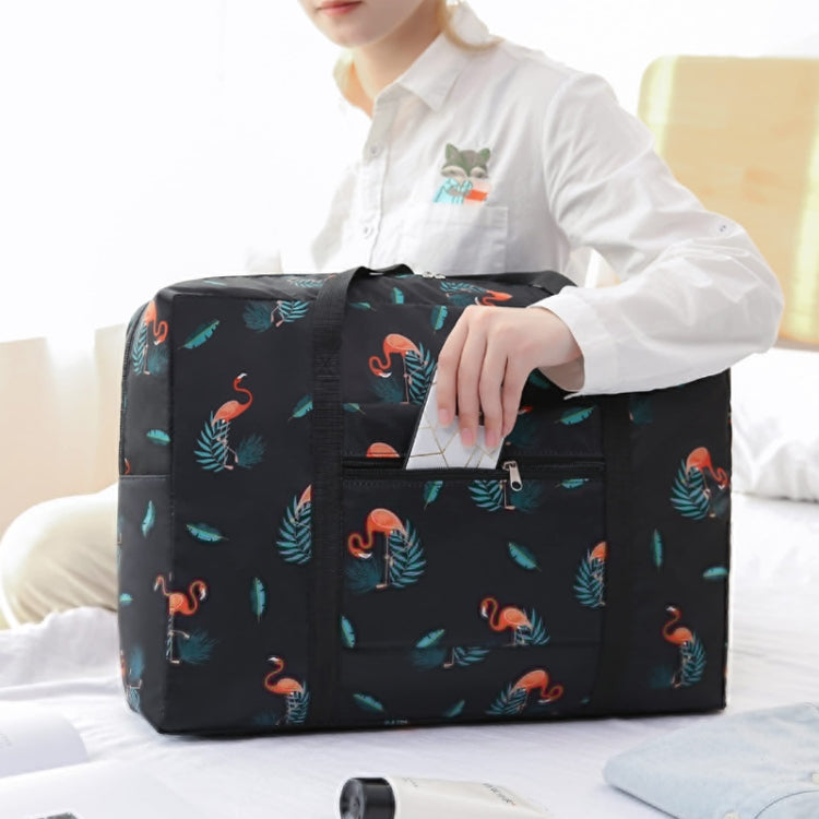 Black flamingo-pattern travel storage bag with front zipper pocket and handles