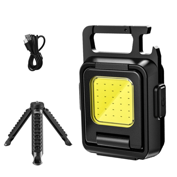 Black mini COB keychain flashlight with fold-out tripod legs
