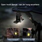 Black COB keychain flashlight hanging from an open hook