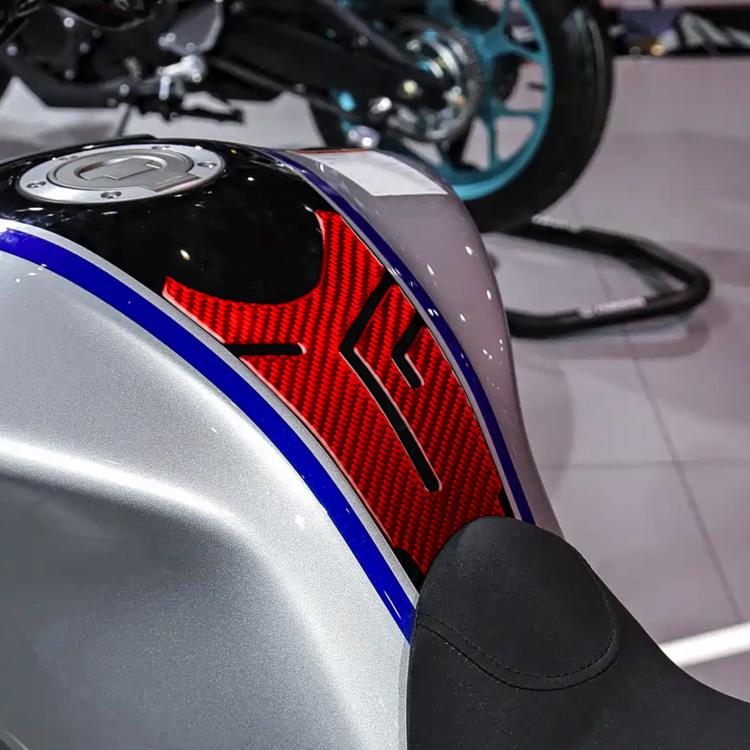 Motorcycle fuel tank decal with red carbon herringbone texture and blue trim lines