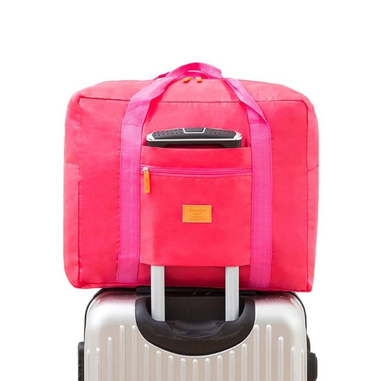 Bright pink trolley storage bag with front zip pocket and top handle for luggage trolley storage