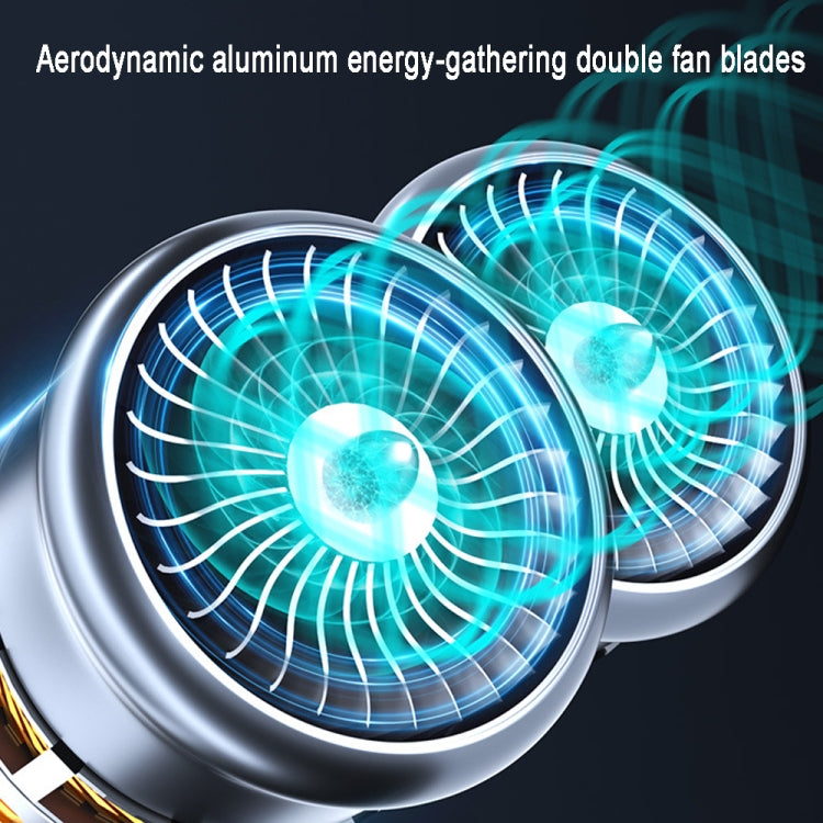 Close-up of dual fan blades inside a car vacuum cleaner motor housing