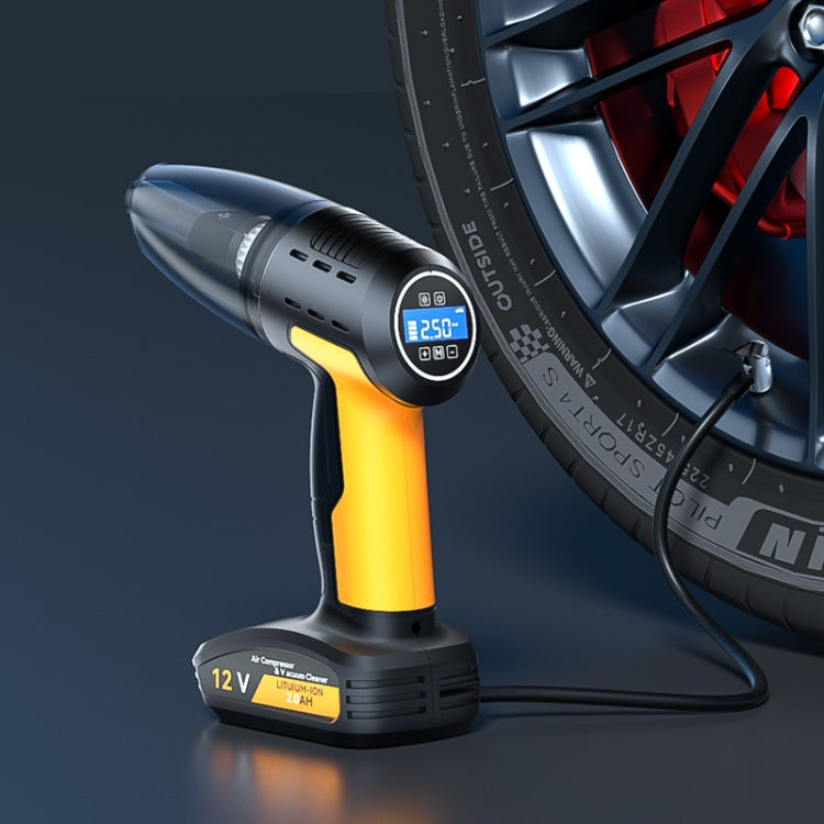 Handheld car vacuum cleaner with yellow and black body, nozzle and digital pressure display
