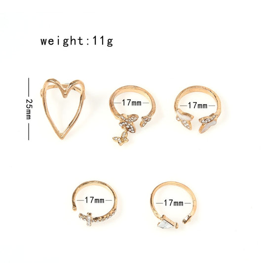 Gold-tone hollow heart and butterfly knuckle rings, 17mm size, 11g total