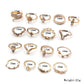 Assorted gold-tone boho rings with gemstone details, sizes labeled in mm