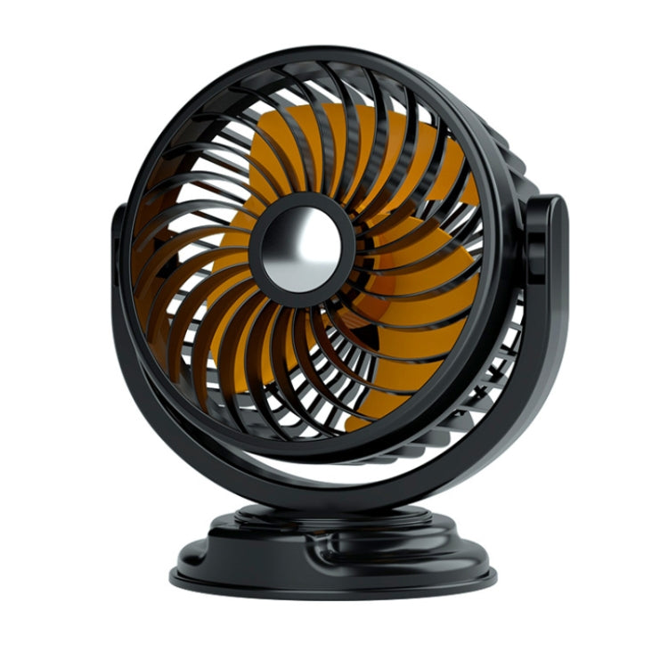 Black car fan with orange blades and circular center hub on a stable base