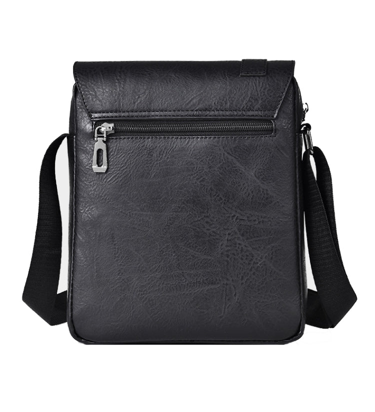 Black leather-look crossbody bag with top flap and adjustable side strap