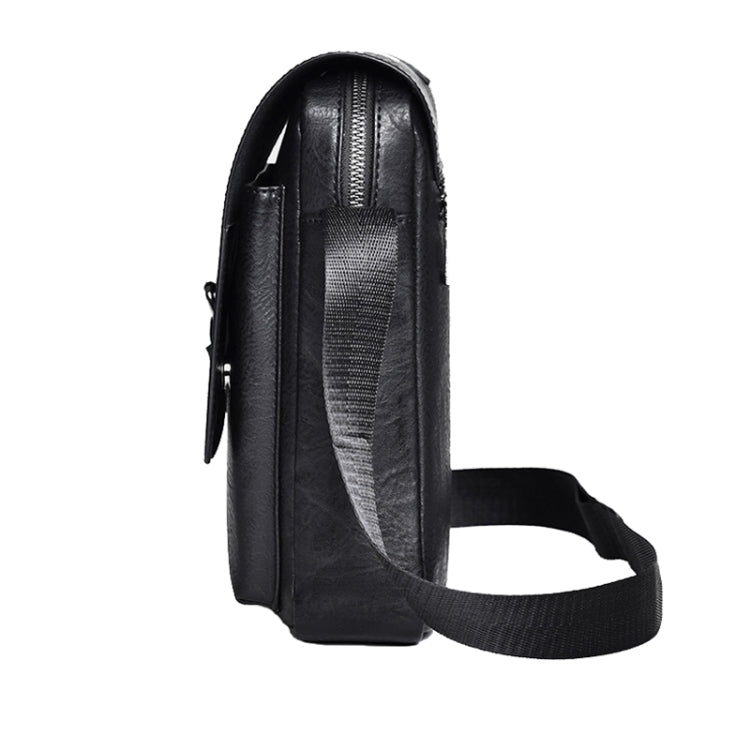 Black vintage crossbody bag side view with adjustable woven shoulder strap