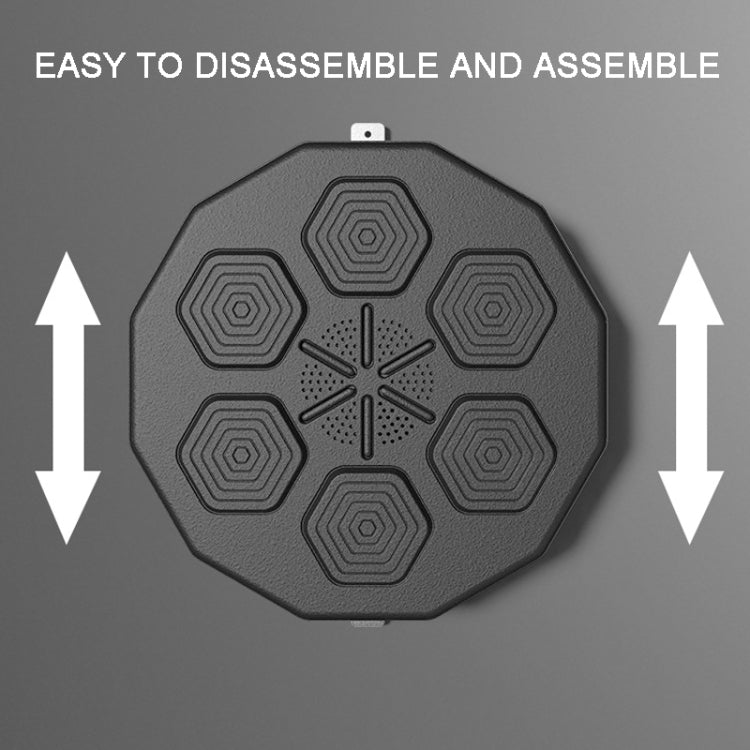 Electronic boxing trainer with height and disassembly arrows on the octagonal body