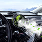 Car rotatable silent fan with black grille and green fan blades on dashboard