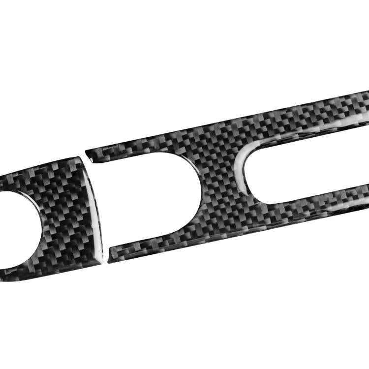 Black carbon fiber glove box sticker with circular and rectangular cutout details