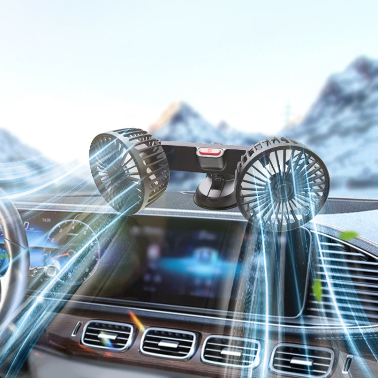 Double-head car USB fan mounted on dashboard, two fan heads blowing air.
