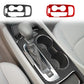 Carbon-fiber gear panel trim installed around shifter and cup holders in center console
