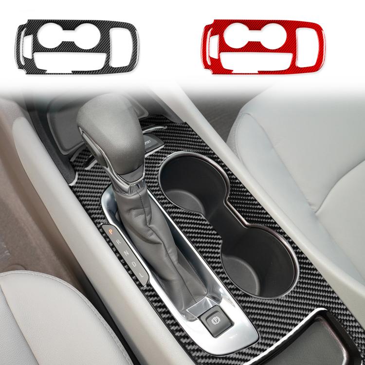 Carbon-fiber gear panel trim installed around shifter and cup holders in center console