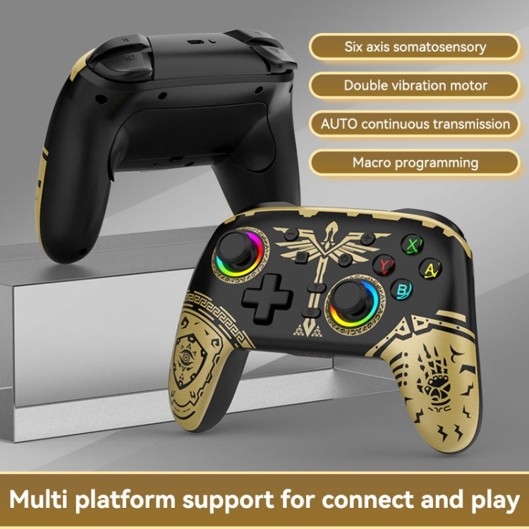 Black wireless gamepad controller shown with gold-trim patterned front view