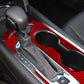 Red carbon-fiber style gear panel sticker applied on shifter surround panel
