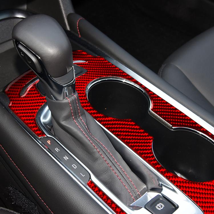 Red carbon-fiber style gear panel sticker applied on shifter surround panel