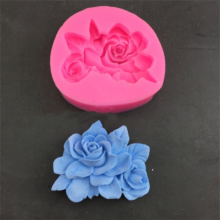 Pink silicone 3-petal flower mold with gardenia-style raised blossom