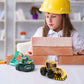 Child with teal and orange solar engineering vehicle toys on boxes during play