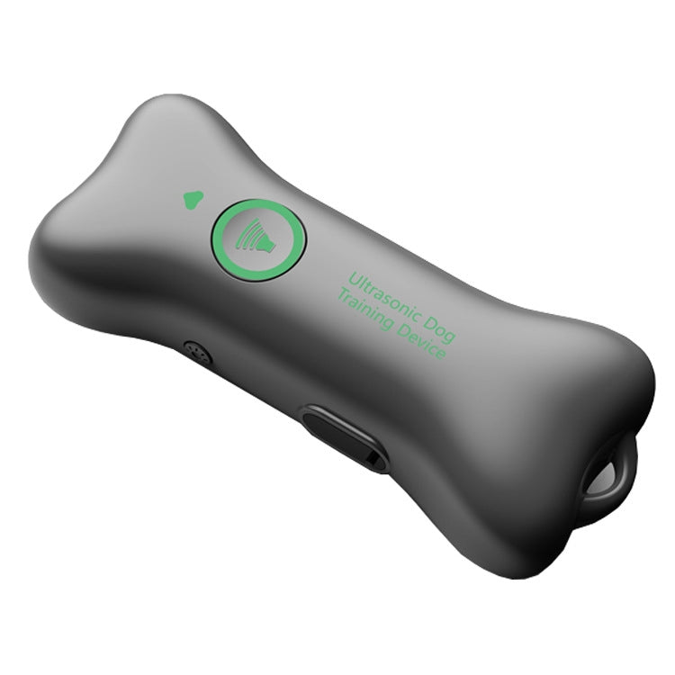 Handheld ultrasonic training device, dark gray body with green ring and side button