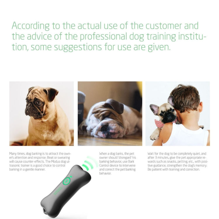Handheld ultrasonic training device shown with user guidance graphics, dark gray