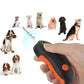 Ultrasonic dog repeller held in hand with orange control buttons and green power light