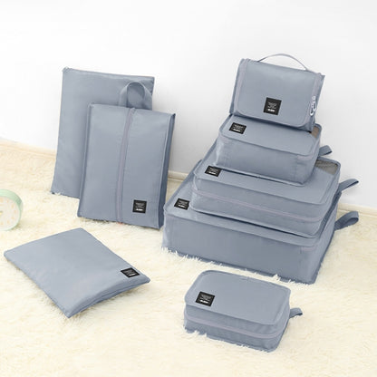 Light blue travel clothing storage bags set with multiple folding compartments