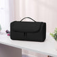Black storage bag with curved handle and front flap zip closure
