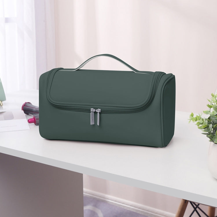 Dark green storage bag with top handle and front flap zip closure