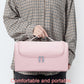 Pink storage bag with front flap and handle for hair dryer accessories