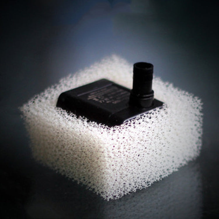 White filter cotton pad around a black pump base for a pet water fountain