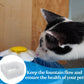 White pet water fountain filter cotton pad beside a cat drinking