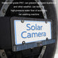 Solar license plate frame camera close-up with camera lens centered below