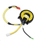 Steering wheel clock spring coil with yellow wiring harness and black circular module