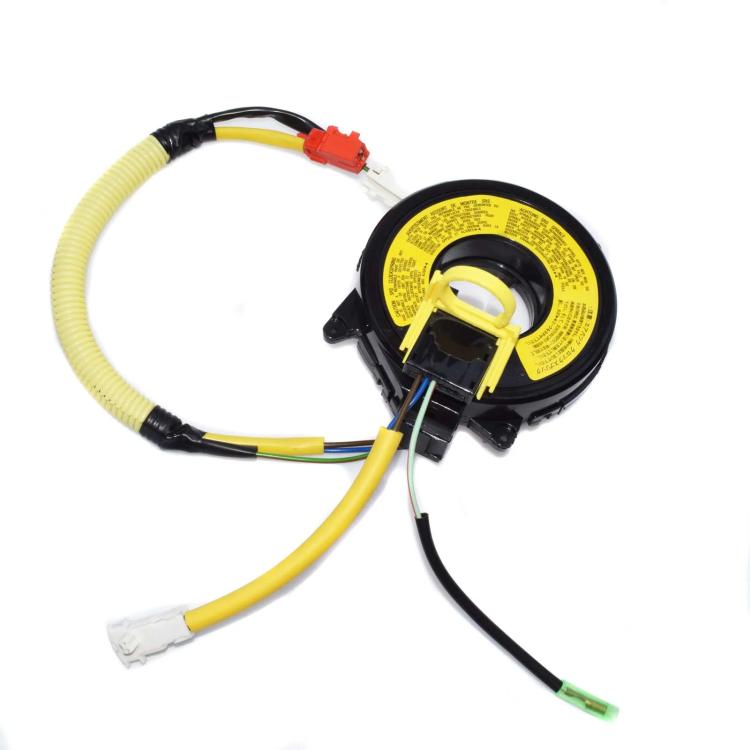 Steering wheel clock spring coil with yellow wiring harness and black circular module