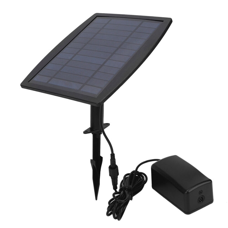 Solar aeration pump with angled solar panel, stakes, and black control adapter