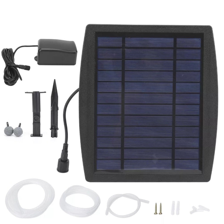 Solar aeration pump kit laid out, including solar panel, controller, stakes, and air tubing