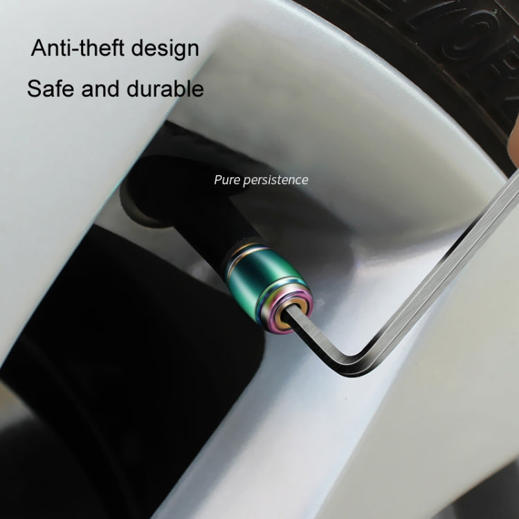 Colorful rainbow tire valve stem cap installed on car wheel valve stem