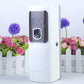 White automatic fragrance sprayer with front sensor window and spray nozzle opening