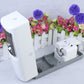 White fragrance sprayer base with open compartment and mounting cover
