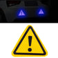 Yellow triangular reflective warning sticker with exclamation mark icon