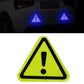 Green triangular reflective warning sticker with exclamation mark icon