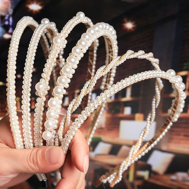 Pearl beaded headband with multiple arched strands and small round faux pearls