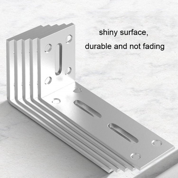 Silver right-angle mounting bracket with shiny finish, wide slots, and round holes